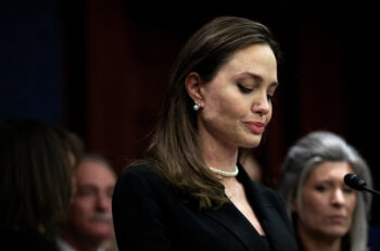 Actor Angelina Jolie speaks beside members of Congress on the Violence Against Women Act, on Capitol Hill in Washington, U.S., February 9, 2022. REUTERS/Tom Brenner/File Photo