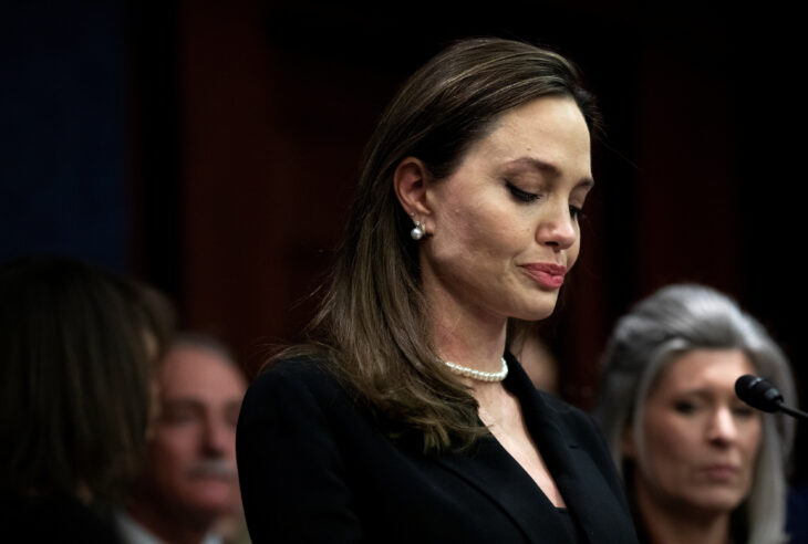 Actor Angelina Jolie speaks beside members of Congress on the Violence Against Women Act, on Capitol Hill in Washington, U.S., February 9, 2022. REUTERS/Tom Brenner/File Photo